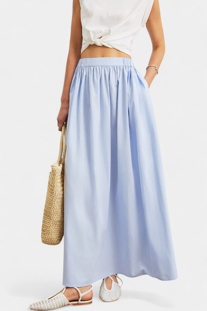 Saias Yora em A com cintura elástica e bolsos